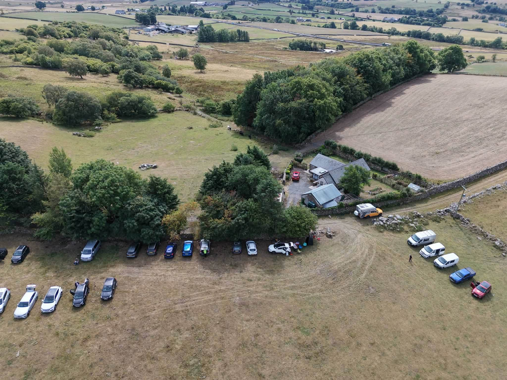 Aerial view of farmland and group dig site